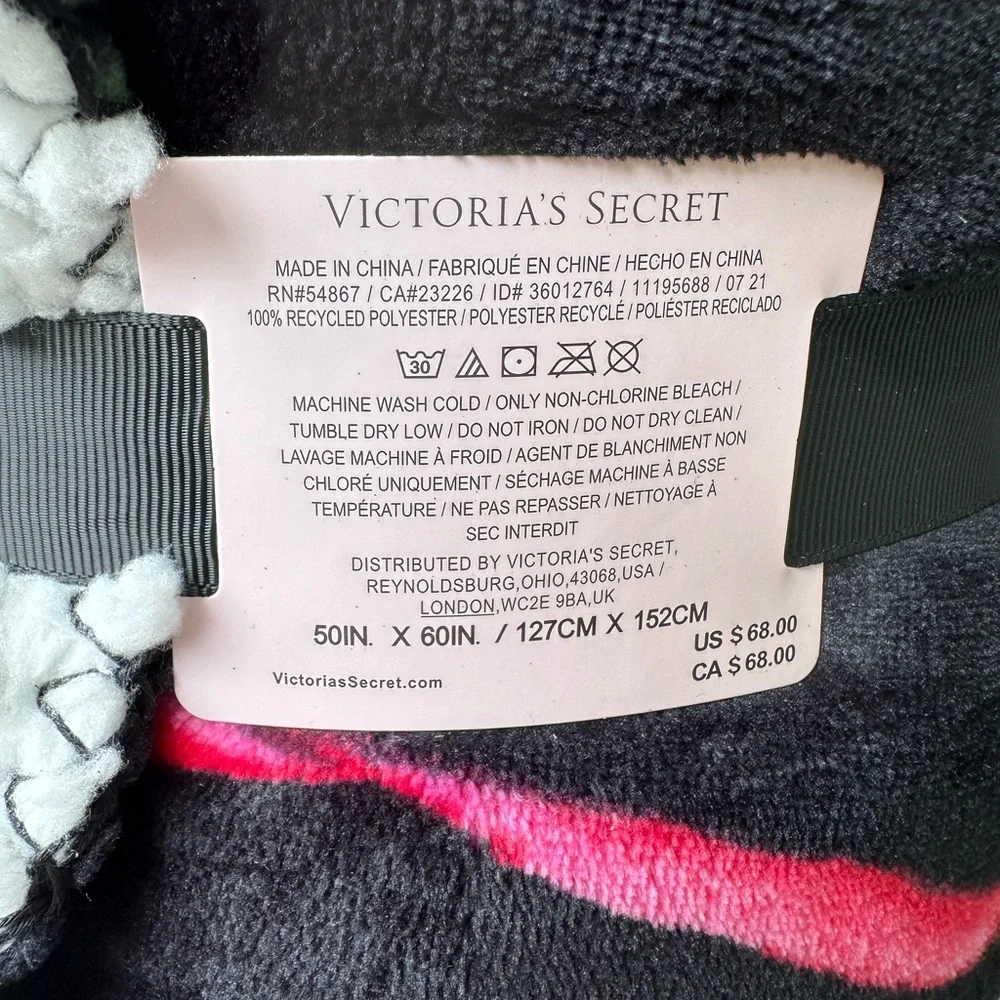 NEW Victoria’s Secret Sherpa Blanket 50”X 60” blk w/ red & pink flowers.